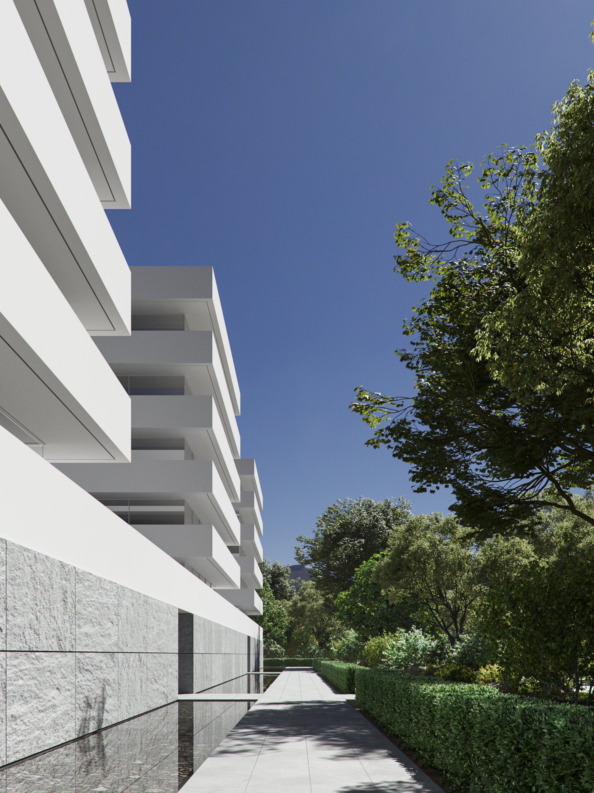 Zonas comunes y acceso exterior de edificio residencial